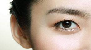 An Asian woman with hooded eyes